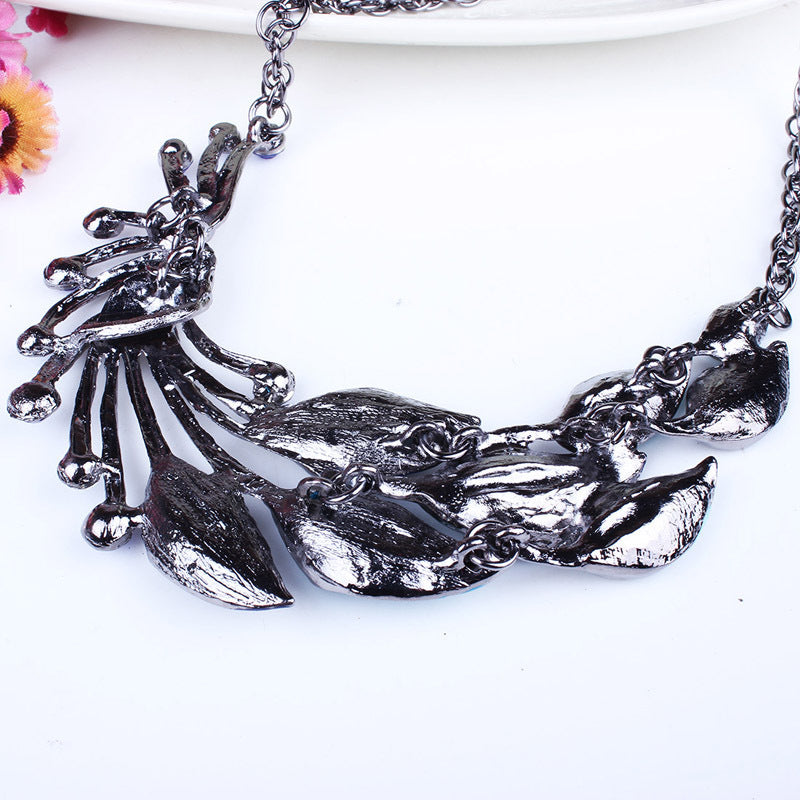 Popular Drop Oil Curved Leaf Necklace & Earring Set