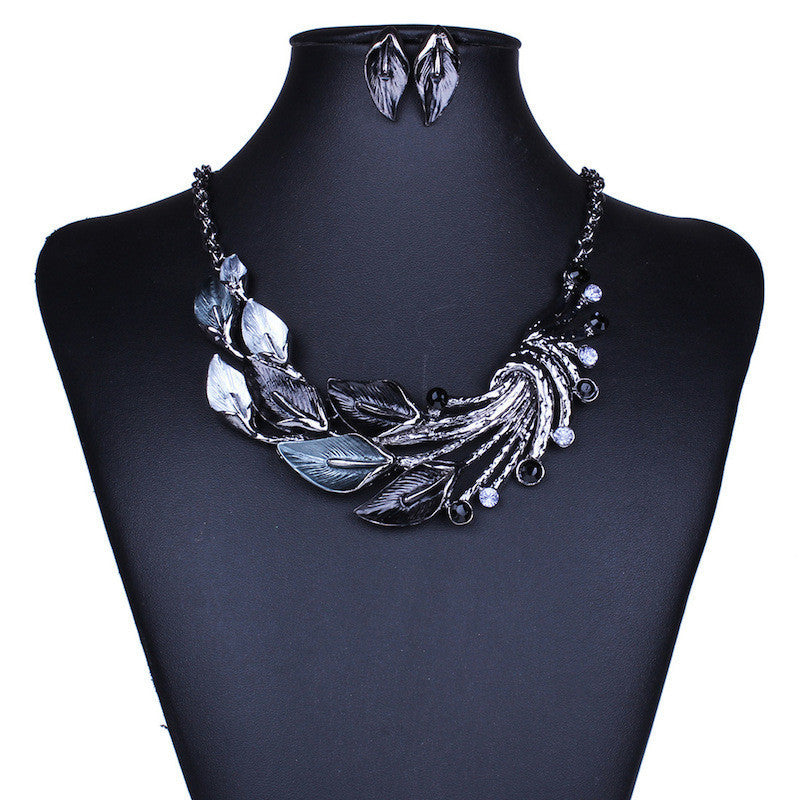 Popular Drop Oil Curved Leaf Necklace & Earring Set