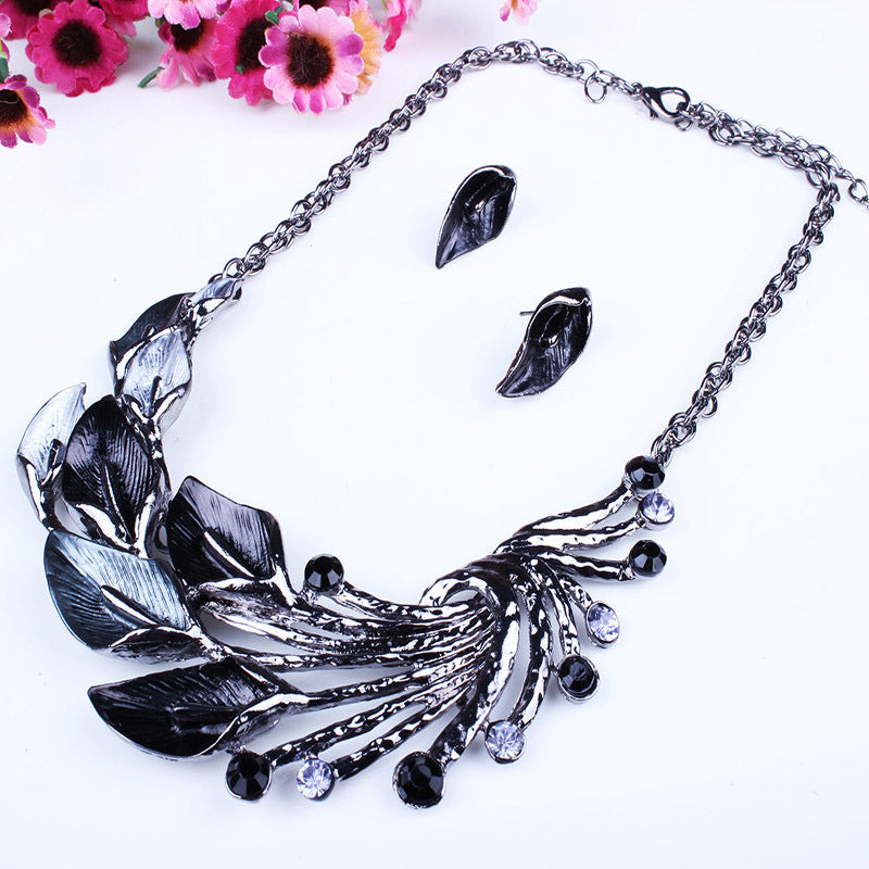 Popular Drop Oil Curved Leaf Necklace & Earring Set